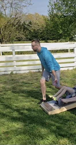 playing cornhole left-handed